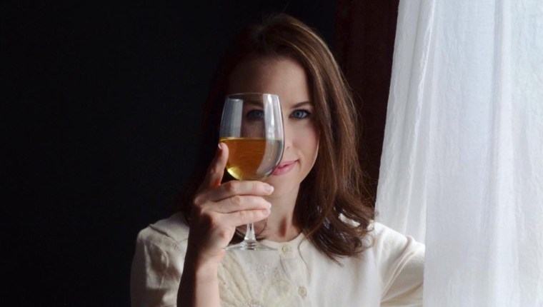 Rebecca Sherrow with a glass of wine